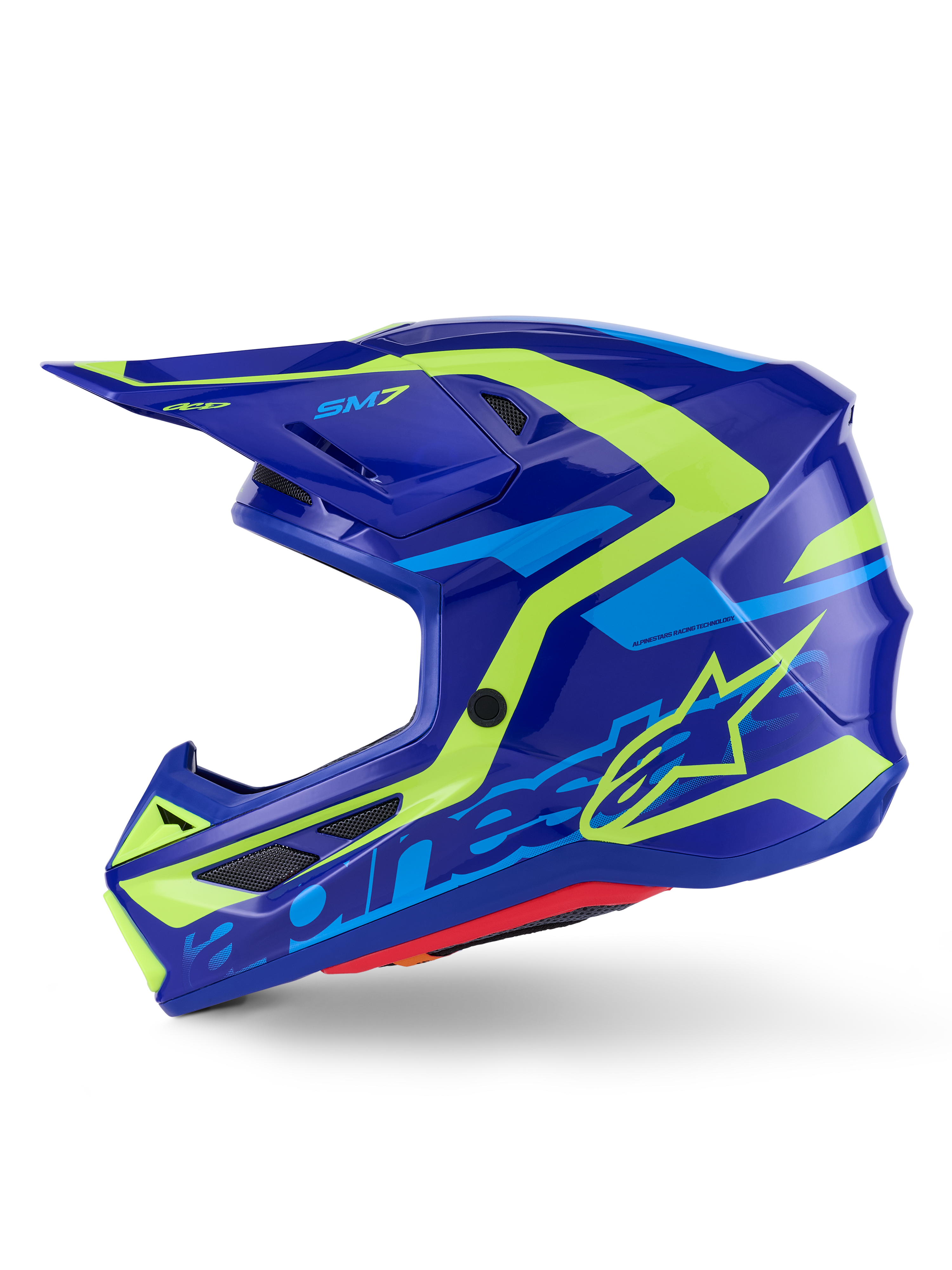 Casco Alpinestars S-M7 Deed, casco da motocross, blu e giallo fluo lucido, vista laterale, calotta aerodinamica in composito con vivaci grafiche gialle e azzurre, dotato di prese d'aria con rete e visiera per prestazioni off-road