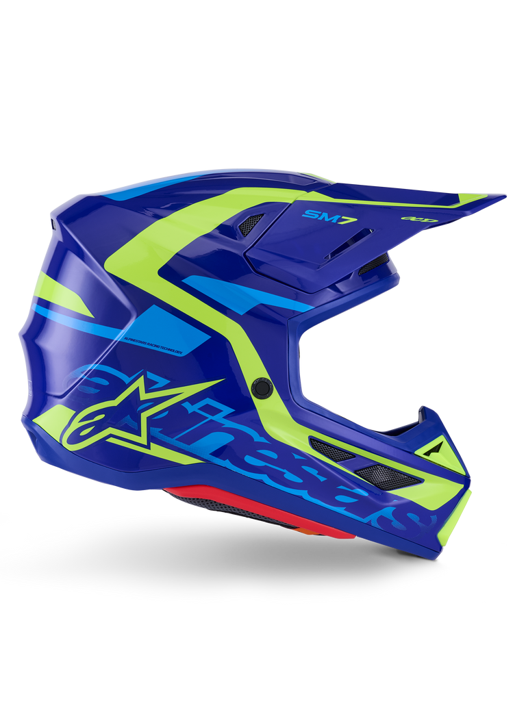 Alpinestars S-M7 Deed Helmet ECE 22.06, casco da motocross, blu e giallo fluo lucido, vista laterale con calotta aerodinamica e logo Alpinestars in evidenza, accenti grafici giallo brillante e azzurro, diverse porte di ventilazione e visiera integrata per gare fuoristrada d'élite
