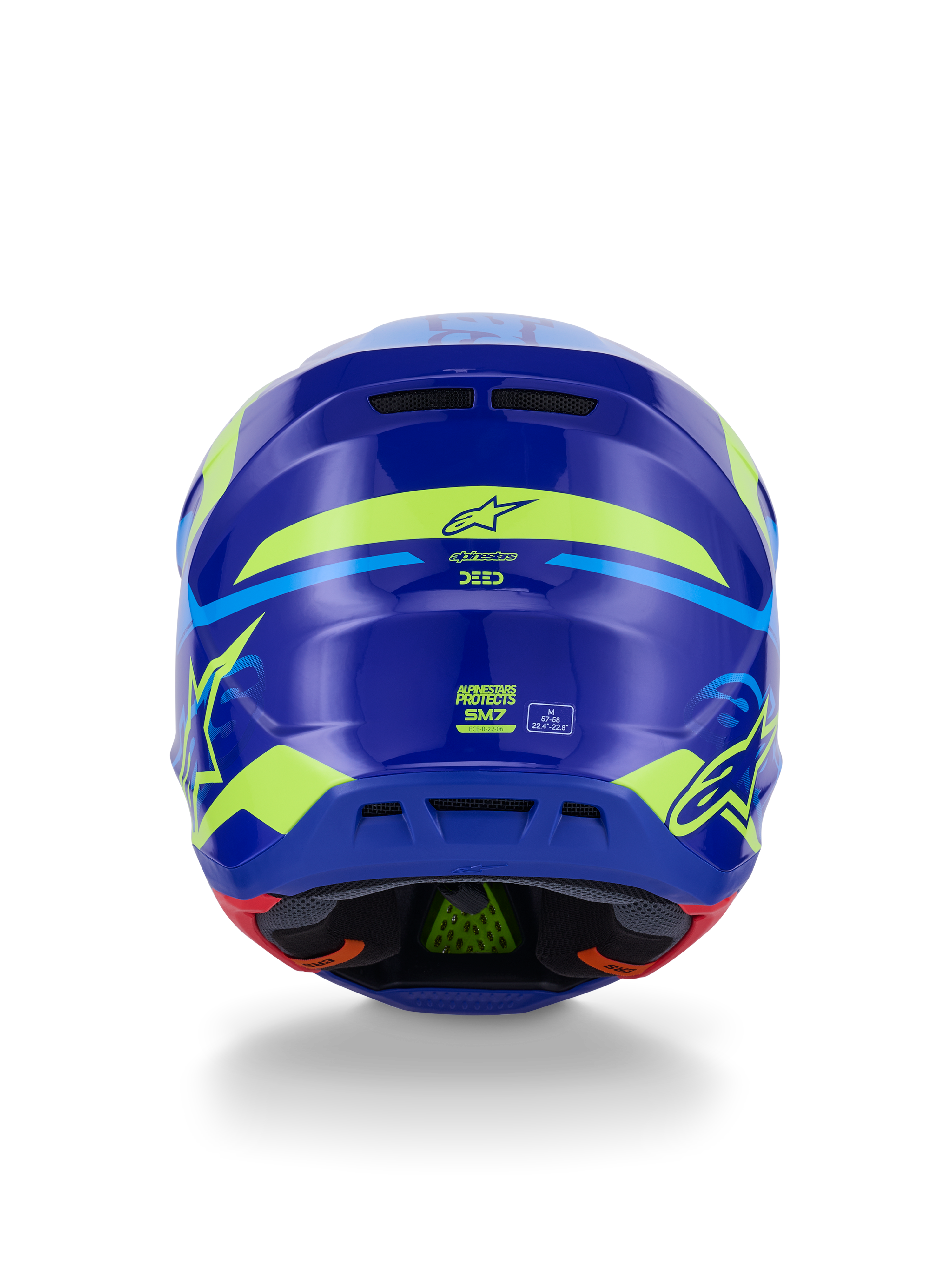 Alpinestars Casco S-M7 Deed ECE 22.06, casco da motocross, vista posteriore, blu giallo fluo lucido, con grafiche giallo fluorescente audaci e loghi a stella, prese di scarico posteriori e imbottitura interna visibile con tecnologia PLASMA verde.