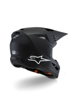 Alpinestars S-M3 Youth Solid Helmet ECE 22.06, casco da motocross, nero opaco, vista posteriore di tre quarti con loghi Alpinestars bianchi, design della calotta aerodinamico con visiera integrata e prese d'aria, protezione off-road per ragazzi