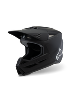 Alpinestars S-M3 Youth Solid Helmet ECE 22.06, casco da motocross, nero opaco, vista di profilo laterale con logo Alpinestars bianco, calotta aerodinamica con prese d'aria e visiera integrata, protezione professionale per la testa off-road per giovani piloti