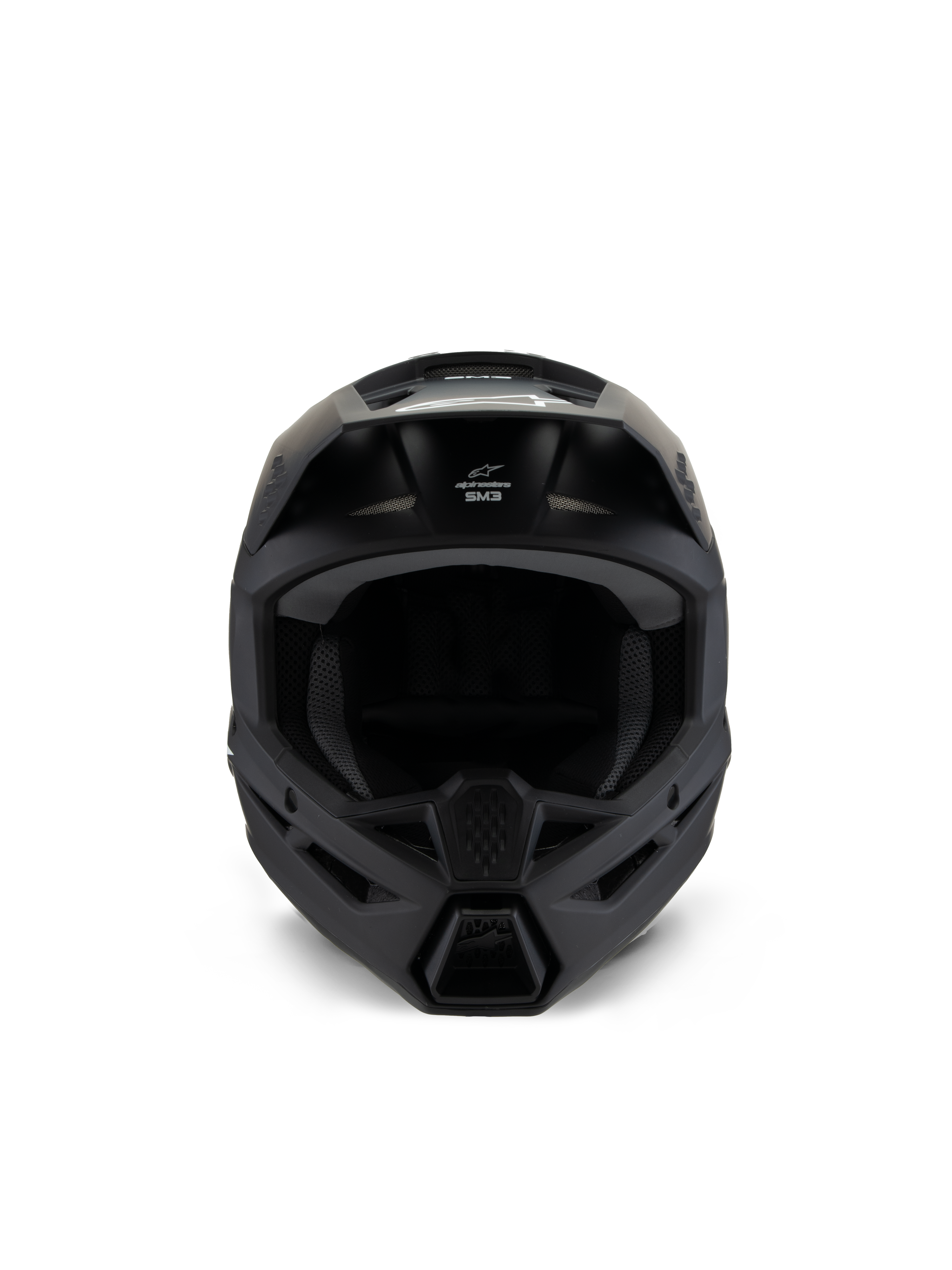 Casco Alpinestars S-M3 Youth Solid, casco da motocross, nero opaco, vista frontale, con finitura opaca, prese d'aria sulla mentoniera e sulla fronte, logo SM3 bianco, design aerodinamico per corse fuoristrada