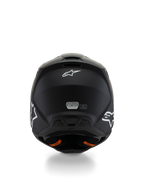 Alpinestars S-M3 Youth Solid Helmet ECE 22.06, casco da motocross, nero opaco, vista posteriore con loghi a stella bianchi e adesivo di certificazione ECE, linguette arancioni del sistema di rilascio di emergenza, calotta protettiva aerodinamica per giovani piloti