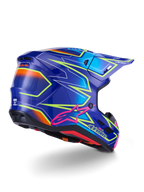Casco Alpinestars S-M7 Cast, casco da motocross, blu, rosa e giallo fluo lucido, vista posteriore a tre quarti che mostra la calotta aerodinamica con grafiche angolari audaci, logo Astar rosa e porte di ventilazione integrate per corse off-road