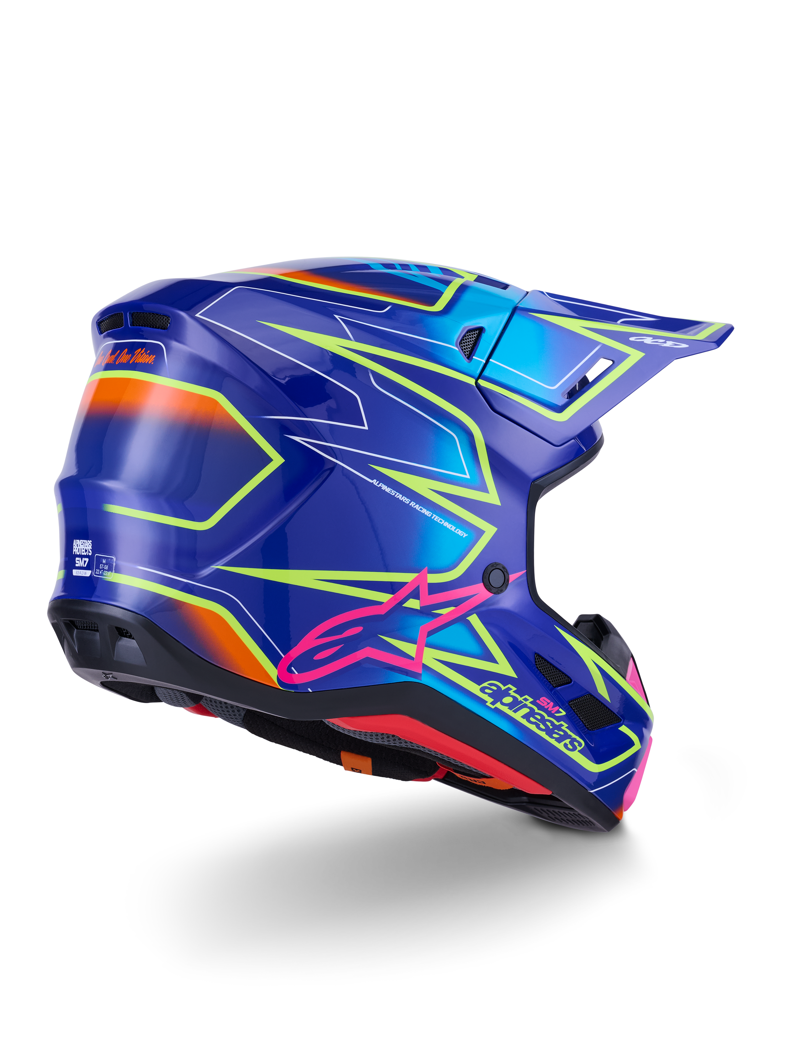 Casco Alpinestars S-M7 Cast, casco da motocross, blu, rosa e giallo fluo lucido, vista posteriore a tre quarti che mostra la calotta aerodinamica con grafiche angolari audaci, logo Astar rosa e porte di ventilazione integrate per corse off-road