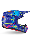 Casco Alpinestars S-M7 Cast, casco da motocross, blu, rosa e giallo fluo lucido, vista di profilo laterale con motivi geometrici audaci, logo Alpinestars rosa e calotta aerodinamica ventilata