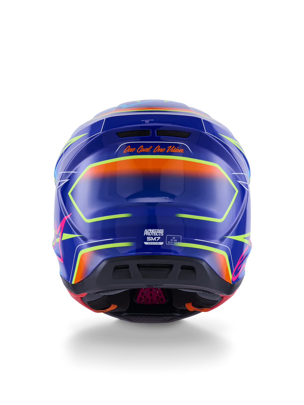 Alpinestars S-M7 Cast Helmet ECE 22.06, casco da motocross, blu, rosa e giallo fluo lucido, vista posteriore con lo slogan 'One Goal. One Vision.', calotta aerodinamica in composito con porte di ventilazione integrate e vivaci accenti neon