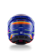 Alpinestars S-M7 Cast Helmet ECE 22.06, casco da motocross, blu, rosa e giallo fluo lucido, vista posteriore con lo slogan 'One Goal. One Vision.', calotta aerodinamica in composito con porte di ventilazione integrate e vivaci accenti neon