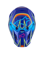 Casco Alpinestars S-M7 Cast, casco da motocross, blu, rosa e giallo fluo lucido, vista frontale caratterizzata da vivaci linee geometriche giallo fluo, logo a stella Alpinestars rosa sulla mentoniera e logo a stella azzurro nell'area della visiera, design della calotta aerodinamico per corse off-road