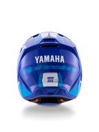 Casco Alpinestars Yamaha S-M3, casco da motocross, blu e bianco lucido, vista posteriore con logo YAMAHA bianco e scritta Alpinestars blu, finitura lucida con prese d'aria visibili ed etichette di certificazione di sicurezza