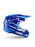 Casco da motocross Yamaha S-M3 Youth, blu e bianco lucido, vista laterale con branding Yamaha e logo a stella Alpinestars, design geometrico con accenti azzurri, calotta ventilata con visiera lunga, protezione per la testa off-road certificata ECE 22.06
