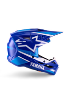 Casco da motocross Yamaha S-M3 Youth, blu e bianco lucido, vista laterale con branding Yamaha e logo a stella Alpinestars, design geometrico con accenti azzurri, calotta ventilata con visiera lunga, protezione per la testa off-road certificata ECE 22.06
