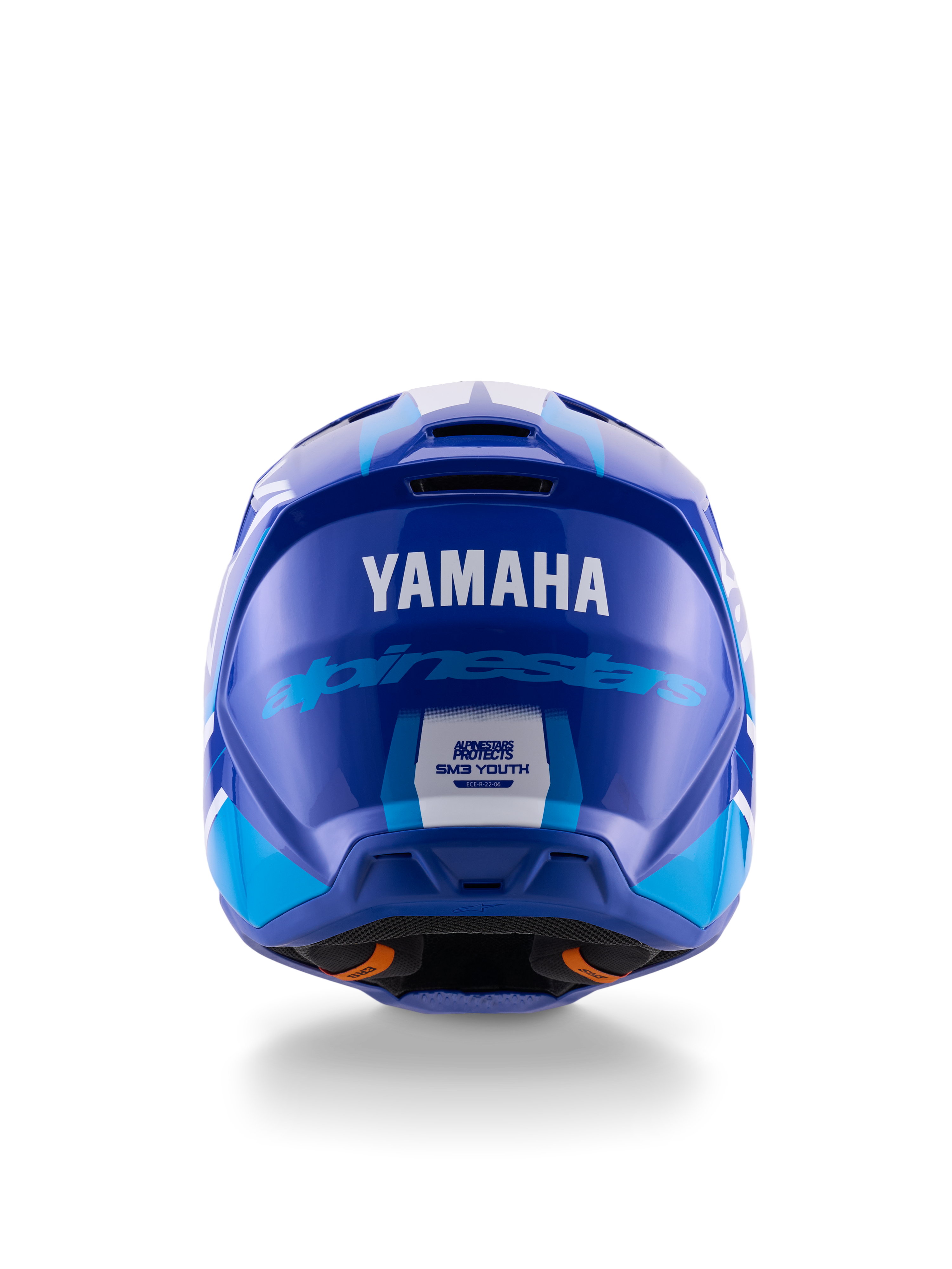 Casco da motocross per ragazzi Yamaha S-M3, vista posteriore, blu e bianco lucido, con loghi Yamaha e Alpinestars ben visibili, design della calotta aerodinamico con etichetta di certificazione ECE 22.06, protezione professionale per gare fuoristrada