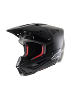Alpinestars S-M5 Solid Helmet ECE 22.06, casco da motocross, nero opaco, vista a tre quarti, con logo Alpinestars bianco sul lato e imbottitura interna rossa, design aerodinamico con molteplici prese d'aria
