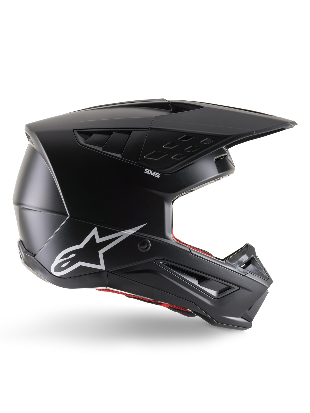 Casco Alpinestars S-M5 Solid, casco da motocross, nero opaco, con logo Alpinestars a stella bianco e rivestimento interno rosso, design aerodinamico con prese d'aria multiple e visiera lunga, protezione off-road certificata ECE 22.06