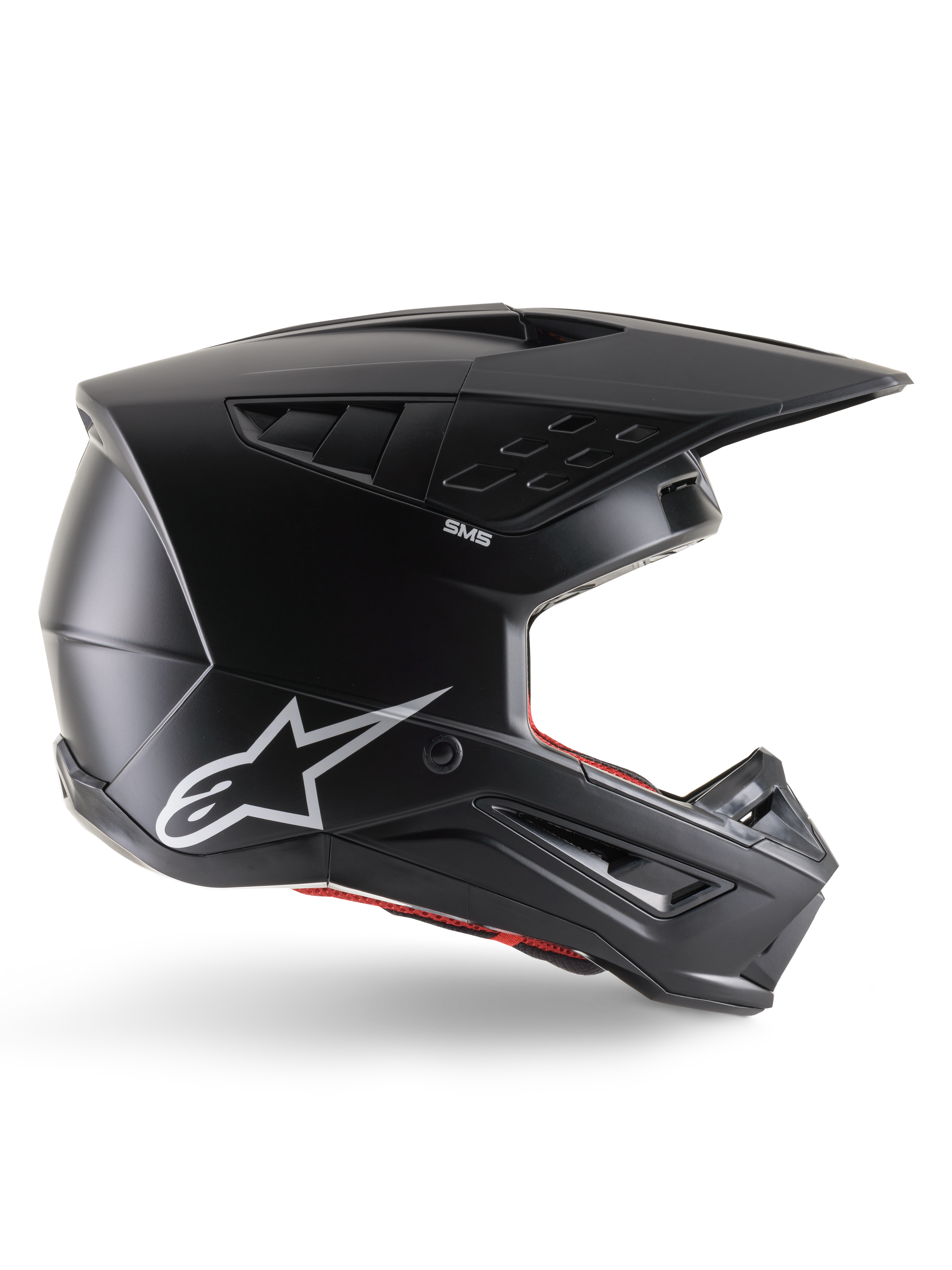 Casco Alpinestars S-M5 Solid, casco da motocross, nero opaco, con logo Alpinestars a stella bianco e rivestimento interno rosso, design aerodinamico con prese d'aria multiple e visiera lunga, protezione off-road certificata ECE 22.06
