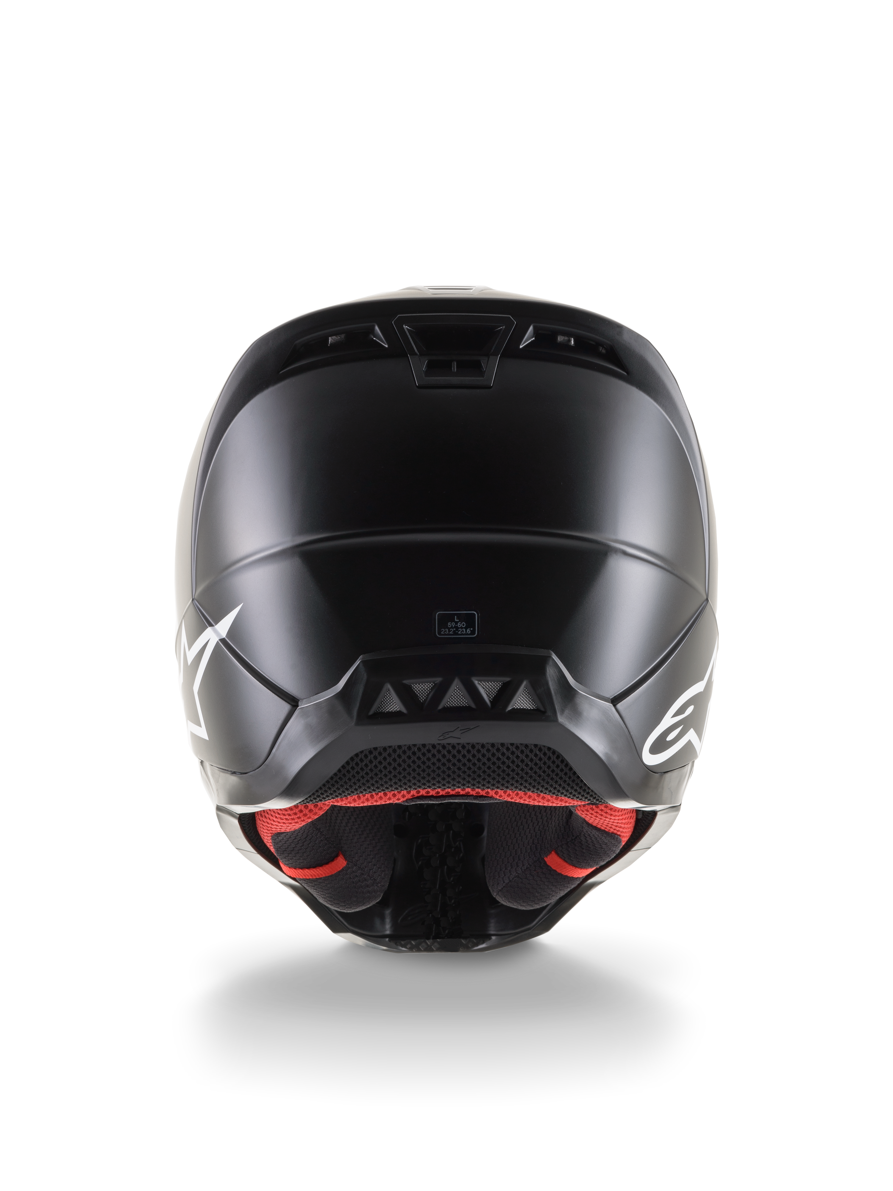 Vista posteriore del casco Alpinestars S-M5 Solid ECE 22.06, casco da motocross, finitura nero opaco, loghi Alpinestars bianchi sui lati, fodera interna rossa, calotta aerodinamica con prese d'aria di scarico.