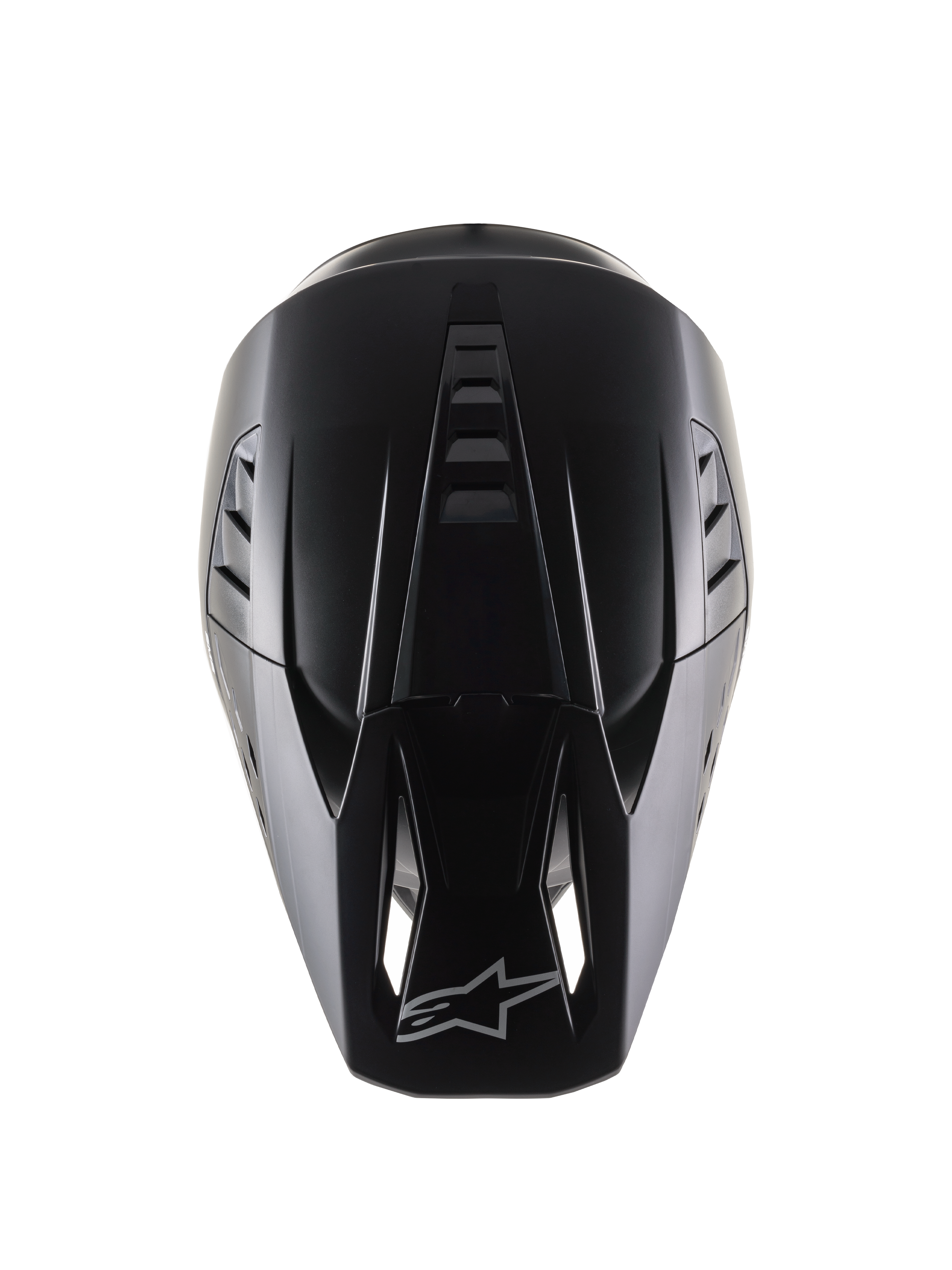 Alpinestars S-M5 Solid Helmet ECE 22.06, casco da motocross, nero opaco, vista dall'alto che mostra la calotta aerodinamica con scanalature di ventilazione, visiera con prese d'aria e logo Alpinestars, elegante finitura opaca progettata per corse off-road