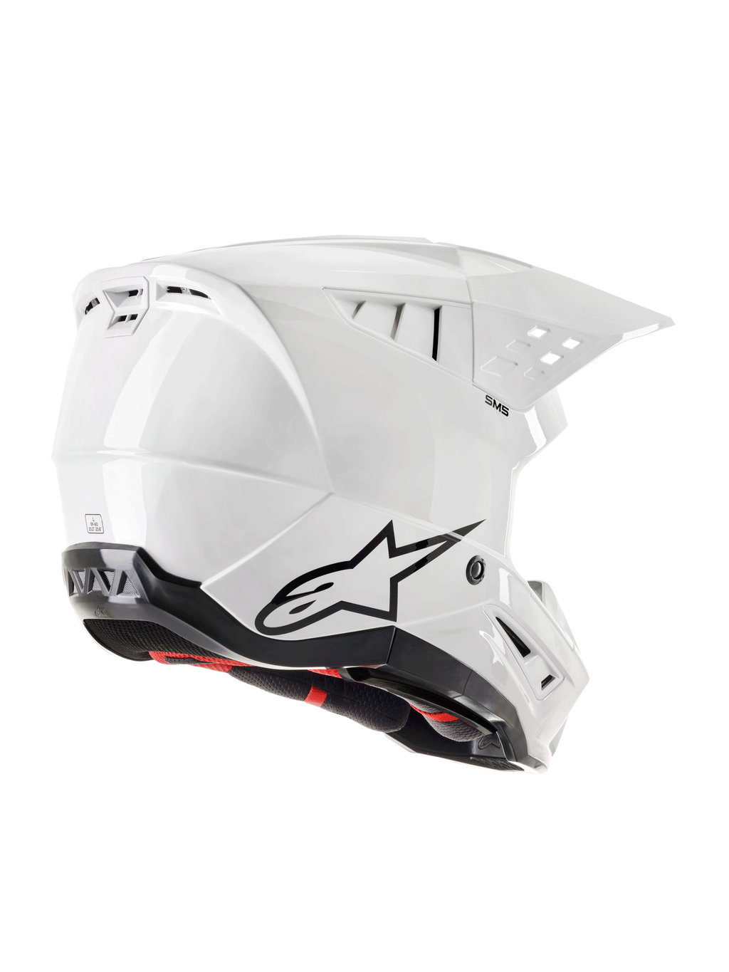 Casco Alpinestars S-M5 Solid ECE 22.06, casco da motocross, bianco lucido, vista posteriore a tre quarti con logo Astars nero, prese d'aria integrate, design aerodinamico della calotta