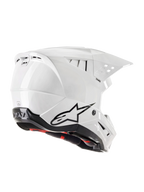 Casco Alpinestars S-M5 Solid ECE 22.06, casco da motocross, bianco lucido, vista posteriore a tre quarti con logo Astars nero, prese d'aria integrate, design aerodinamico della calotta