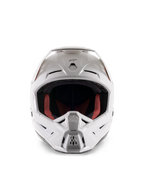 Alpinestars S-M5 Solid Helmet ECE 22.06, casco da motocross, bianco lucido, vista frontale, con prese d'aria multiple sulla mentoniera e sulla fronte, ampia visiera, fodera interna rossa e nera, design aerodinamico per gare fuoristrada