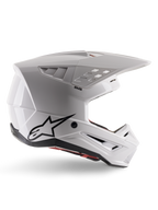 Alpinestars S-M5 Solid Helmet ECE 22.06, casco da motocross, bianco lucido, profilo laterale con design aerodinamico angolare, visiera prominente, prese d'aria integrate, logo Astars nero sul retro e imbottitura interna rossa visibile