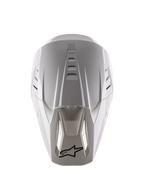 Alpinestars Casco S-M5 Solid ECE 22.06, casco da motocross, bianco lucido, vista dall'alto che mostra le prese d'aria superiori e il logo nero sulla punta della visiera