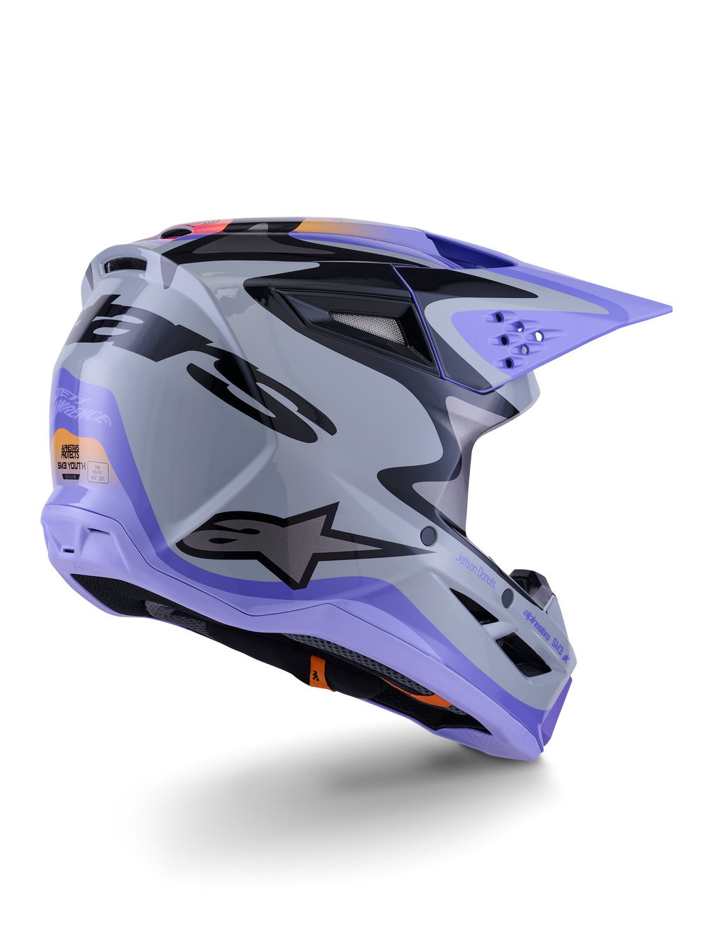 Casco Alpinestars S-M3 Jettson Youth, casco da motocross, grigio, viola e nero lucido, vista posteriore di tre quarti, con visiera viola, logo Alpinestars nero e diverse prese d'aria, design aerodinamico per competizioni off-road per ragazzi