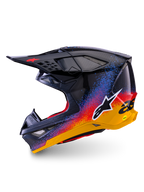 Alpinestars Supertech M10 Black Hole Edizione Limitata, casco da motocross, finitura lucida Black Burst con schizzi sfumati vibranti blu, rossi e gialli, vista laterale che mostra il logo Astars bianco e la trama della calotta in fibra di carbonio.
