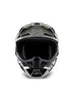 Casco Alpinestars S-M7 Wolf Dust Edizione Limitata, casco da motocross, Dune Black Glossy con grafiche bianche e nere, vista frontale con ampia apertura per la maschera e prese d'aria multiple, visiera aerodinamica con logo Alpinestars e scritta 'One Goal One Vision', protezione specialistica per la testa per il fuoristrada