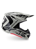 Casco Alpinestars S-M7 Wolf Dust Edizione Limitata, casco da motocross Dune Black Glossy, profilo laterale con grafiche nere audaci e branding, accenti rossi sulla base, protezione aerodinamica per la testa off-road