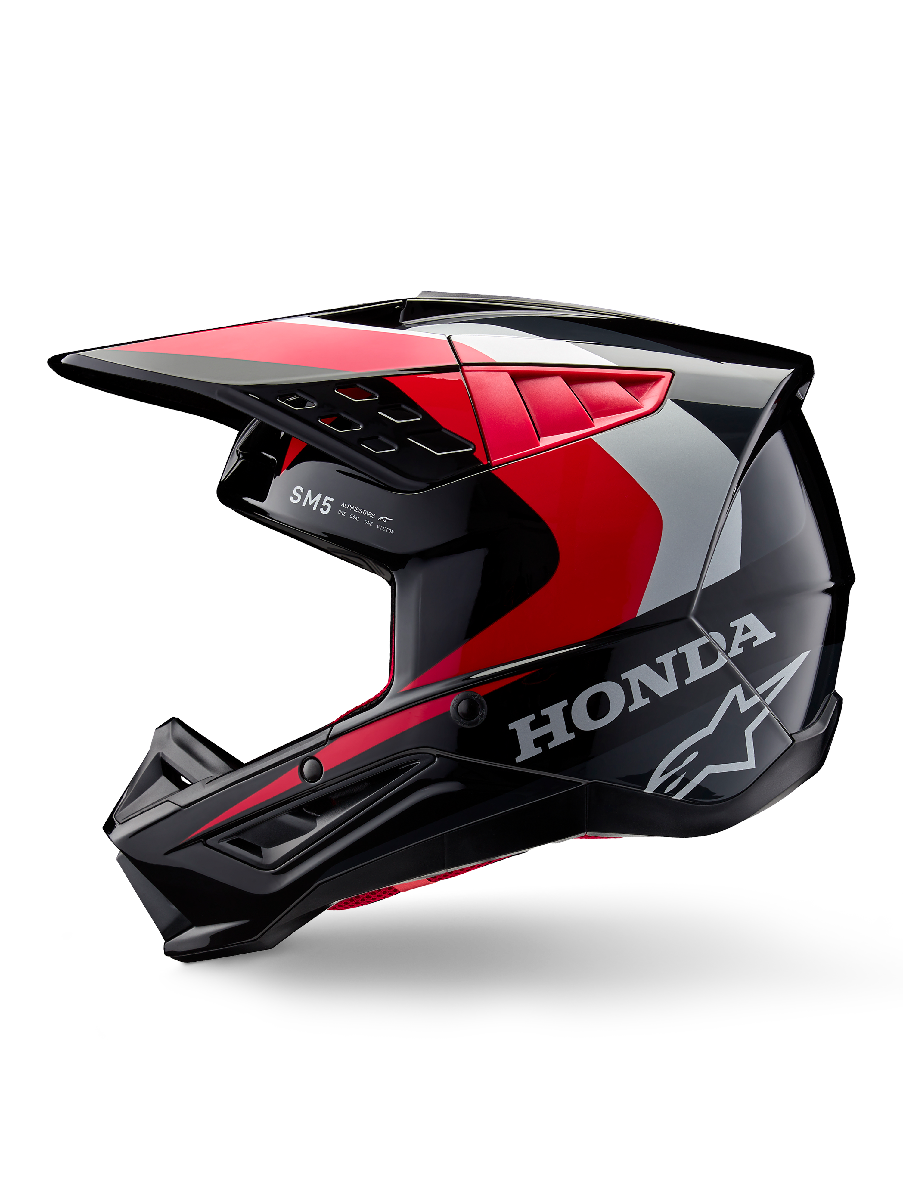 Casco Alpinestars Honda S-M5, casco da motocross, nero, rosso e argento lucido, vista laterale di profilo con marchio Honda e logo Alpinestars a stella, design aerodinamico con visiera integrata e prese d'aria per prestazioni off-road