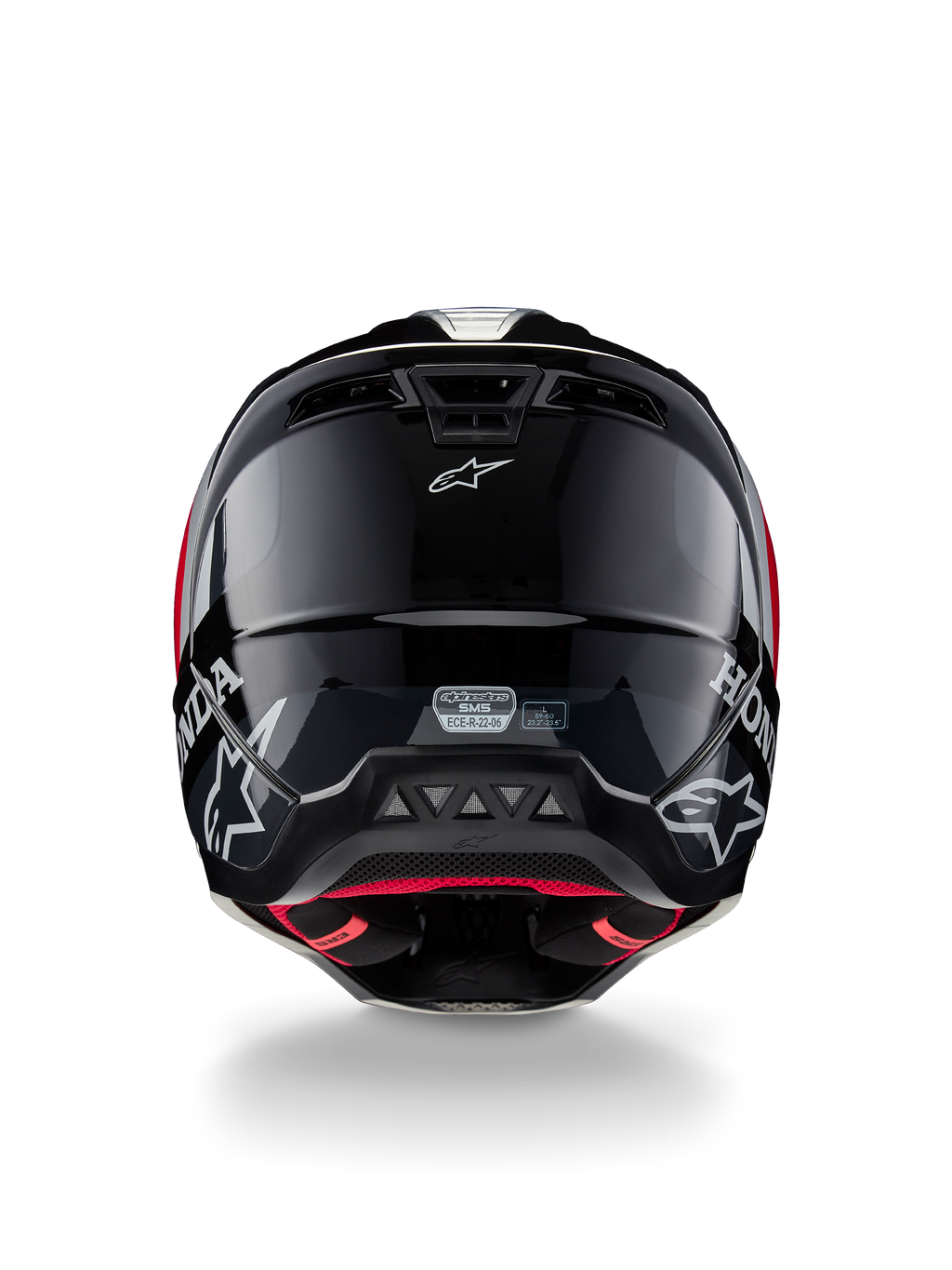 Casco Alpinestars Honda S-M5 ECE, casco da motocross, nero rosso lucido, vista posteriore che mostra la calotta nera lucida con loghi Honda e Alpinestars bianchi, fodera interna rossa e etichetta di certificazione di sicurezza ECE