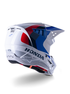 Alpinestars Honda S-M5 Helmet ECE, casco da motocross, bianco, blu e rosso lucido, con branding Honda e loghi Alpinestars, calotta aerodinamica con prese d'aria integrate e visiera regolabile, attrezzatura protettiva per corse fuoristrada