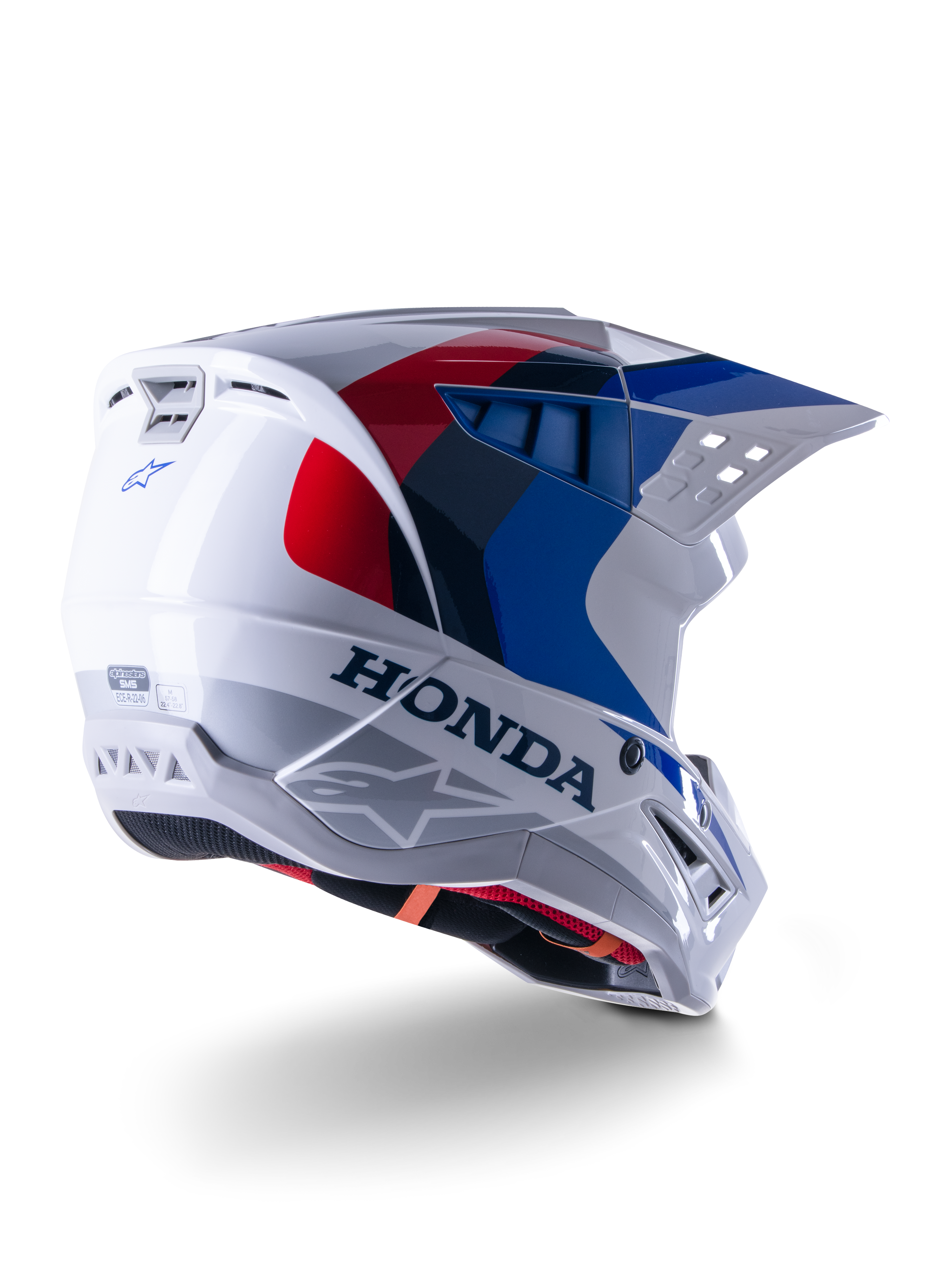 Alpinestars Honda S-M5 Helmet ECE, casco da motocross, bianco, blu e rosso lucido, con branding Honda e loghi Alpinestars, calotta aerodinamica con prese d'aria integrate e visiera regolabile, attrezzatura protettiva per corse fuoristrada