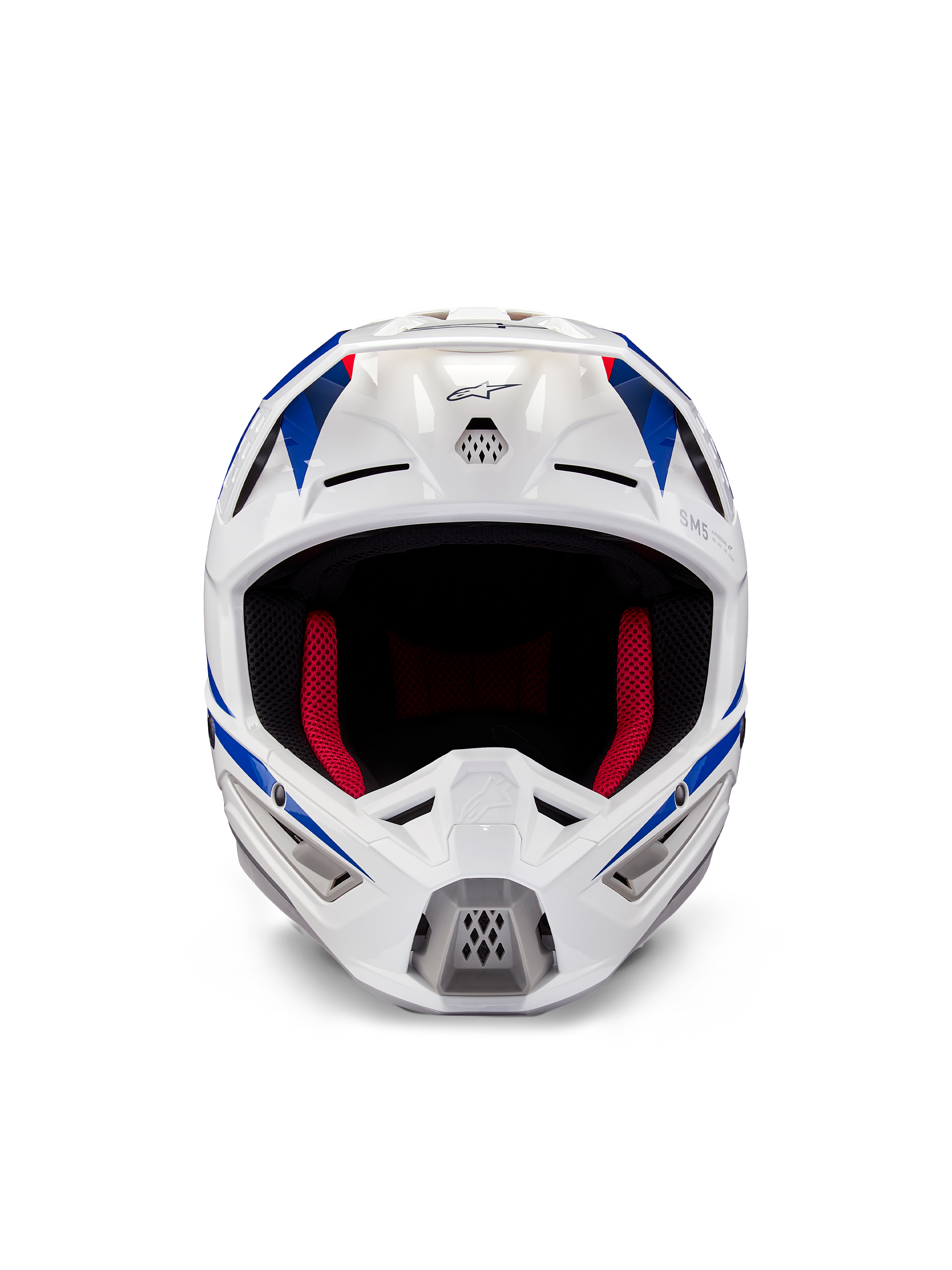 Casco Alpinestars Honda S-M5 ECE, casco da motocross, bianco, blu e rosso lucido, vista frontale con prese d'aria e imbottitura interna rossa, design aerodinamico per la protezione nelle corse fuoristrada