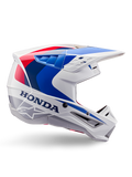 Alpinestars Honda S-M5 Helmet ECE, casco da motocross, bianco, blu e rosso, vista di profilo laterale, design aerodinamico con visiera integrata, molteplici aperture di ventilazione, finitura lucida, marchio Honda in evidenza e logo Alpinestars