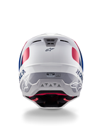 Casco Alpinestars Honda S-M5 ECE, casco da motocross, bianco, blu e rosso lucido, vista posteriore con marchi Honda e Alpinestars, calotta aerodinamica con prese d'aria integrate ed etichetta di certificazione ECE.