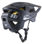 Casco MTB Alpinestars Vector Tech A1, casco da mountain bike, nero opaco con accenti grigio chiaro, profilo laterale-posteriore con aperture di ventilazione, logo a stella Alpinestars bianco, marchio ASTARS e fodera MIPS gialla visibile, con cinturino nero regolabile.