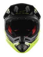 Casco integrale Alpinestars Missile Tech-Air®, casco integrale MTB, nero e giallo fluo lucido, vista frontale con scritta 'One Goal. One Vision.' sulla visiera, imbottitura interna rossa, prese d'aria a rete e marchio ASTARS sulla mentoniera