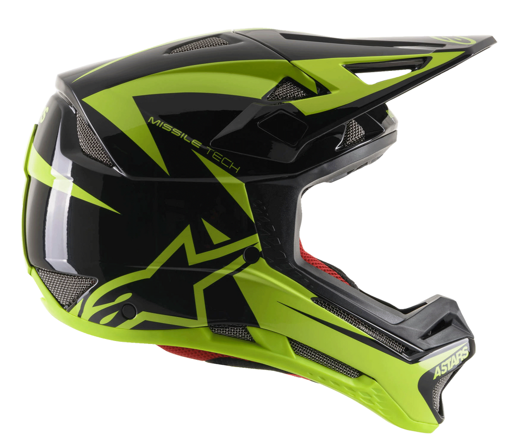 Casco integrale Alpinestars Missile Tech-Air, casco da MTB Downhill, nero e giallo fluo lucido, vista di profilo laterale con prese d'aria a rete aerodinamiche, grande logo a stella giallo fluorescente e marchio MISSILE TECH, rivestimento interno rosso, design aerodinamico ad alte prestazioni per mountain bike