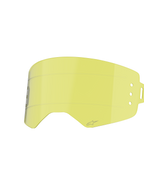 Alpinestars Supertech Roll Off Lens, accessorio per occhiali da motocross, giallo trasparente, con linee di scorrimento orizzontali e punti di attacco laterali per sistemi roll-off, design curvo in policarbonato resistente agli urti