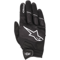 Guanti Alpinestars Atom, guanti da moto leggeri, nero e bianco, con un grande logo a stella bianco sul dorso, pannelli in mesh per la ventilazione, nocche imbottite e chiusura sicura a strappo sul polso