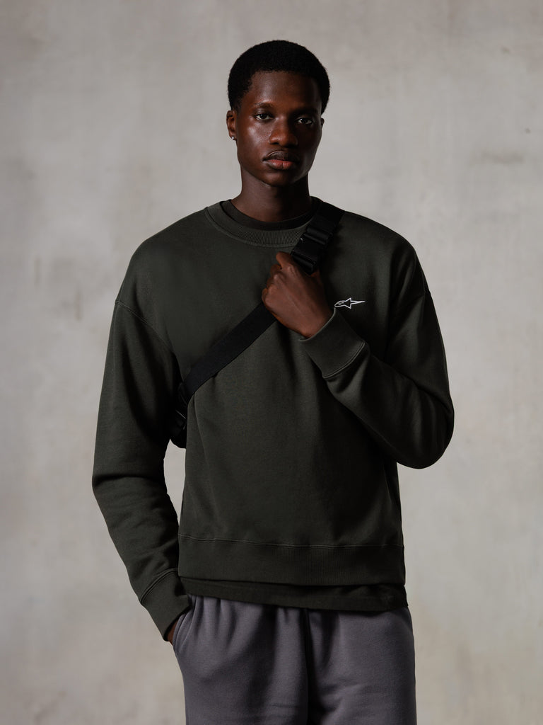 Alpinestars Essentials Ageless Crew, felpa girocollo, Off Black, con un piccolo logo Alpinestars bianco sul petto, colletto e orlo a coste, stile casual lifestyle streetwear