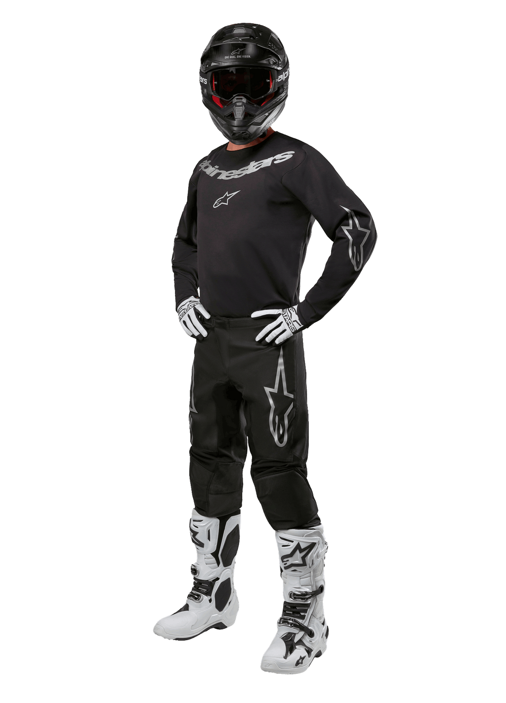 Alpinestars 2024 Fluid Graphite Gear Set, completo motocross nero con loghi grigi e bianchi, maglia e pantaloni abbinati a casco nero coordinato, guanti e stivali bianchi e neri, equipaggiamento protettivo per fuoristrada