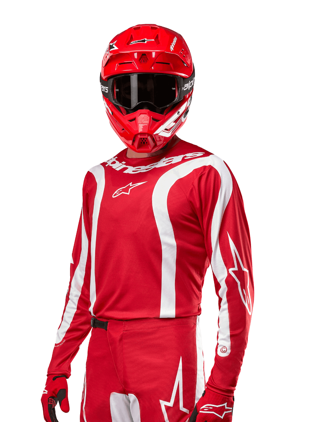 Alpinestars Maglia Fluid Lurv 2024, maglia da motocross, rosso Mars e bianco, indossata con casco e guanti coordinati, design sportivo audace con strisce curve bianche e marchio Alpinestars
