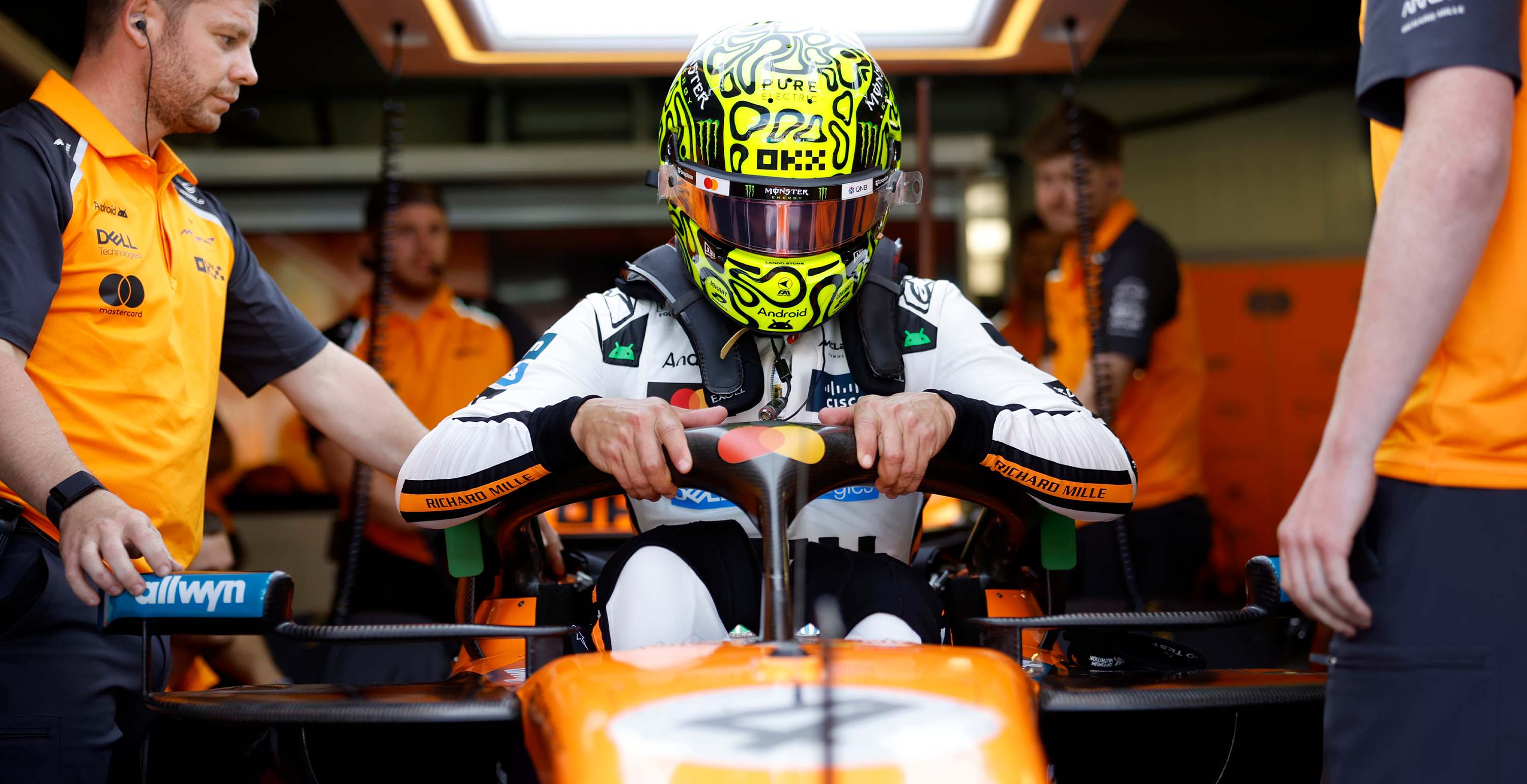Lando Norris about to sit and drive his McLaren F1 Car