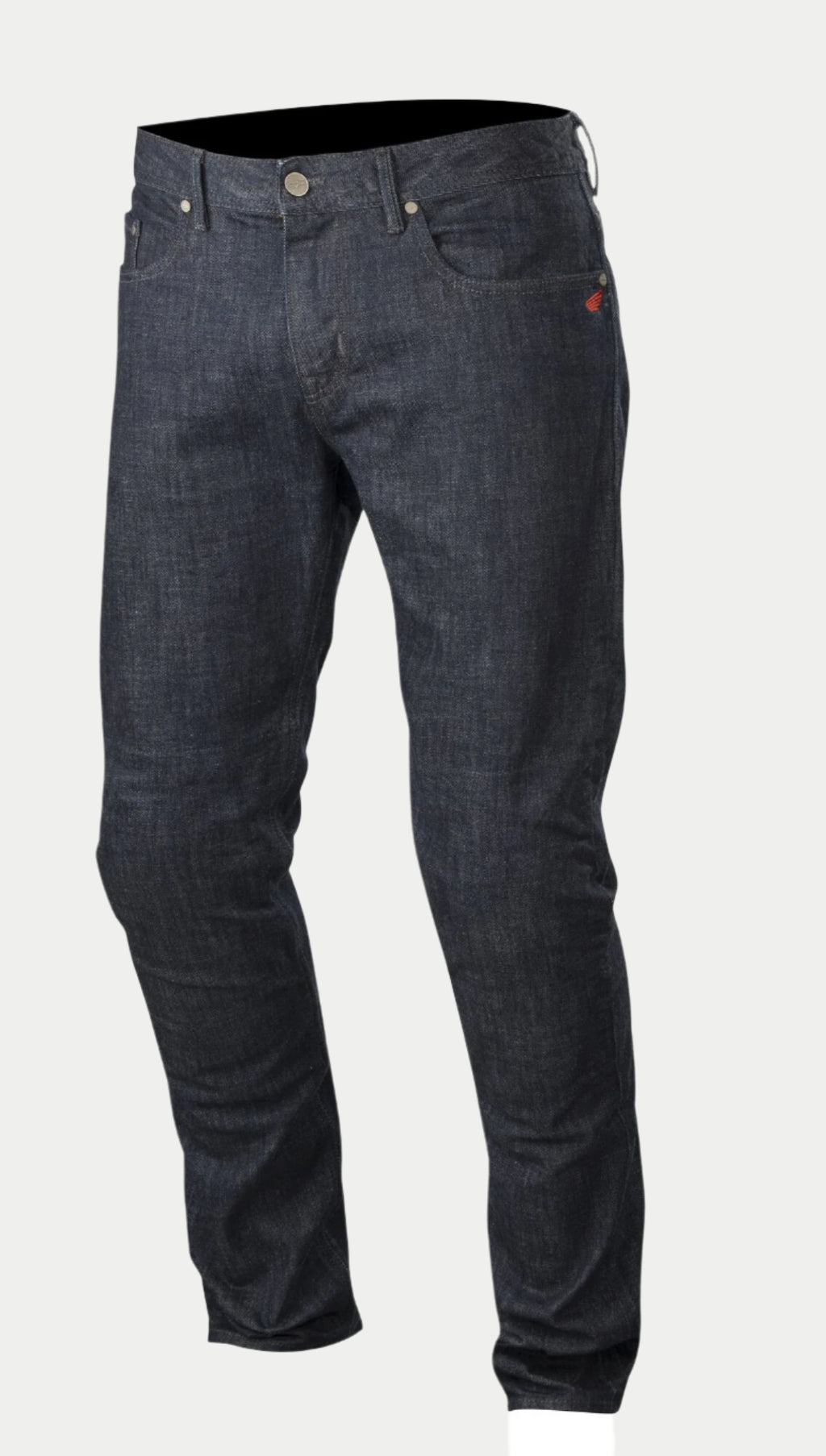 Alpinestars Copper Denim Pants, jeans da moto, blu scuro, con vestibilità regular/dritta, classico design a cinque tasche con un piccolo logo rosso sulla tasca e costruzione della gamba pre-sagomata per la guida urbana.