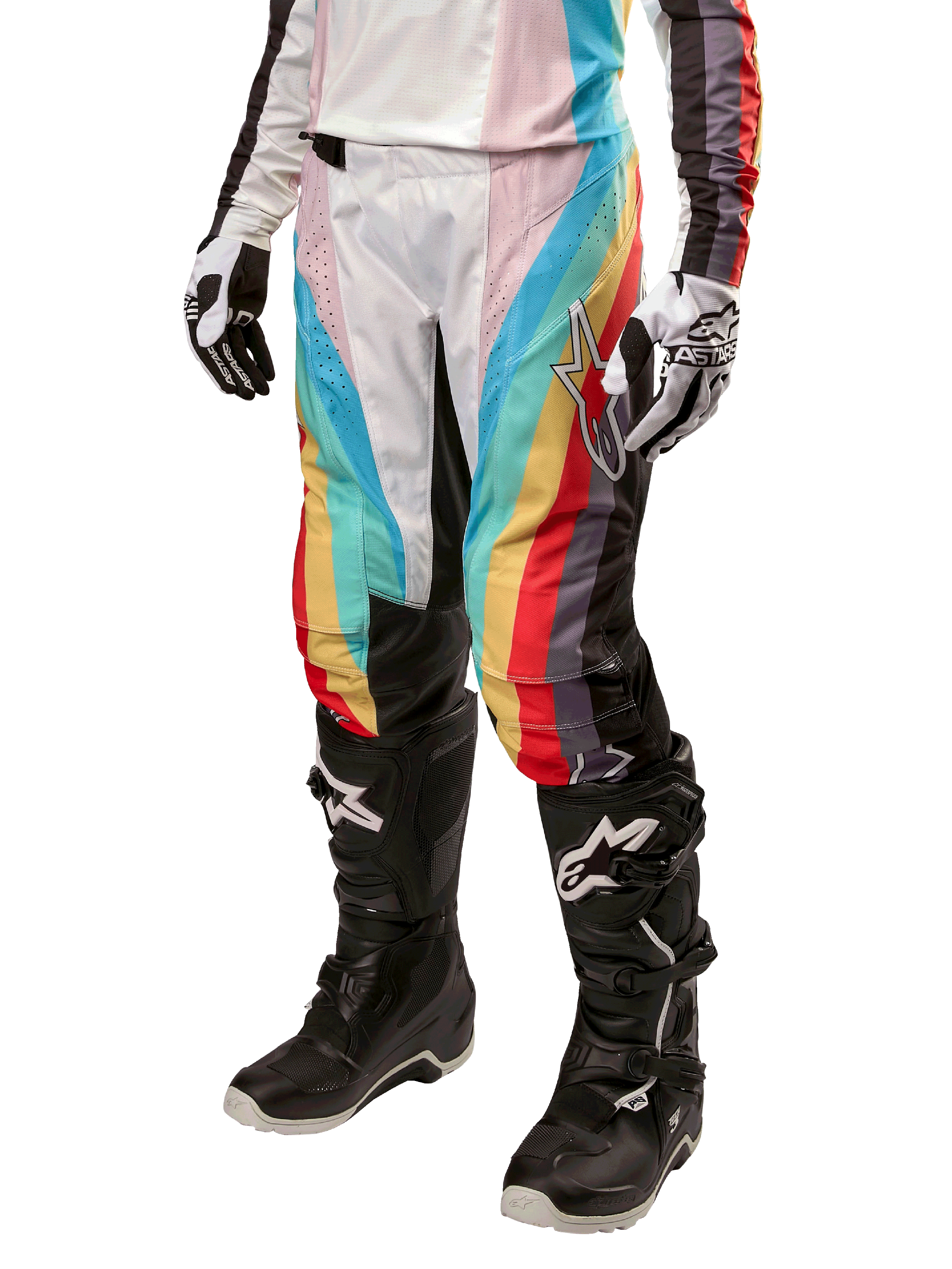 Alpinestars Stella 2024 Techstar Pants, pantaloni da motocross da donna, multicolore nero con strisce diagonali rosse, gialle e blu, indossati con stivali neri e guanti bianchi, dotati di pannelli protettivi neri sulle ginocchia e loghi evidenti per il fuoristrada.
