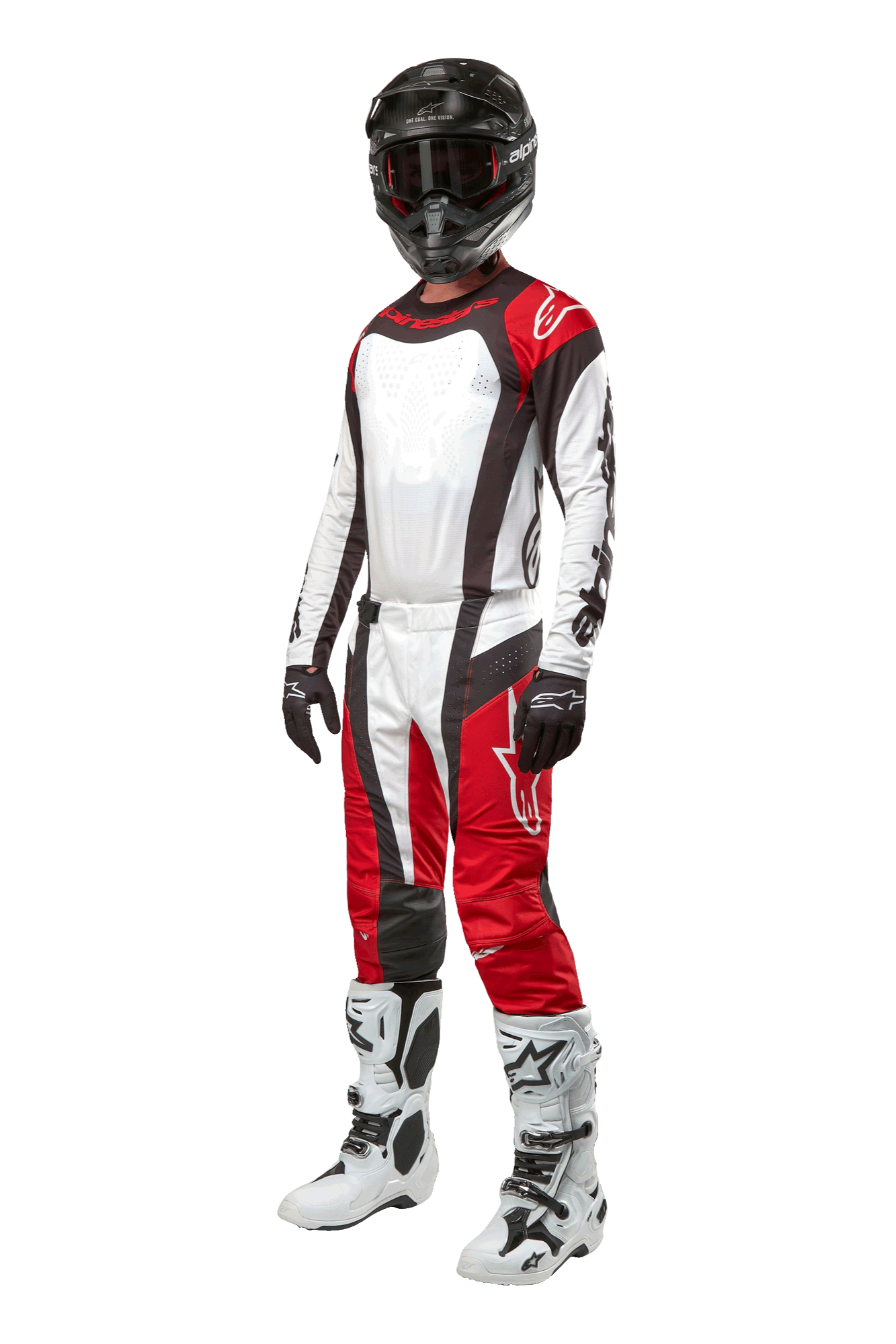 Pilota di motocross con abbigliamento completo Alpinestars, pantaloni Techstar Ocuri 2024 in Mars Red White Black, maglia coordinata, casco nero con occhiali, guanti neri e bianchi, stivali da motocross bianchi, completo professionale da corsa off-road